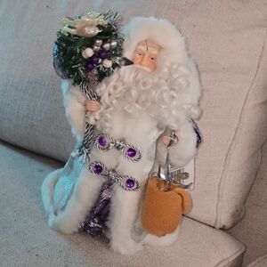 White and Purple Santa Figurine With Glass Ornament
